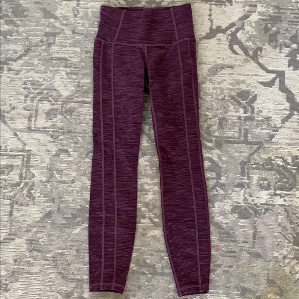 7/8 athleta legging.  Striped maroon color.